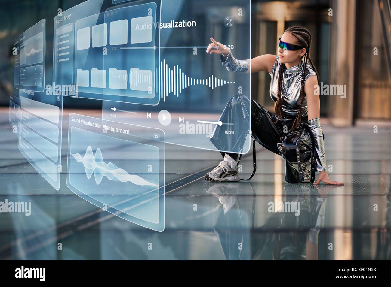 Futuristic woman using a holographic audio interface Stock Photo