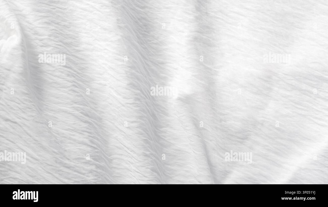 Fabric white textured background with soft elegant waves. Stock Photo