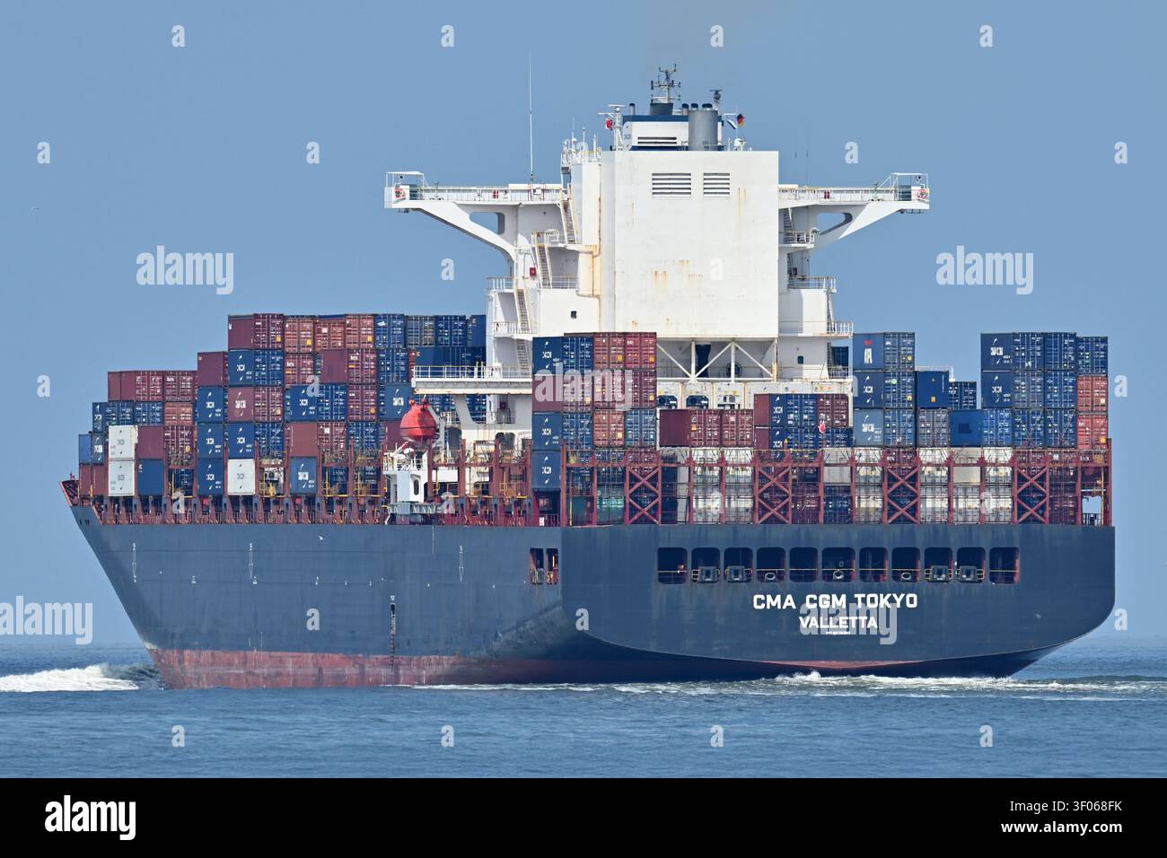 Containership CMA CGM TOKYO passing Cuxhaven Stock Photo