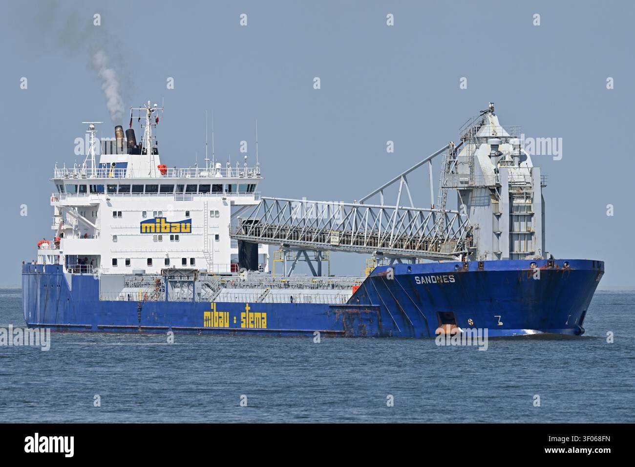 Self-discharging bulk-carrier SANDNES passing Cuxhaven Stock Photo