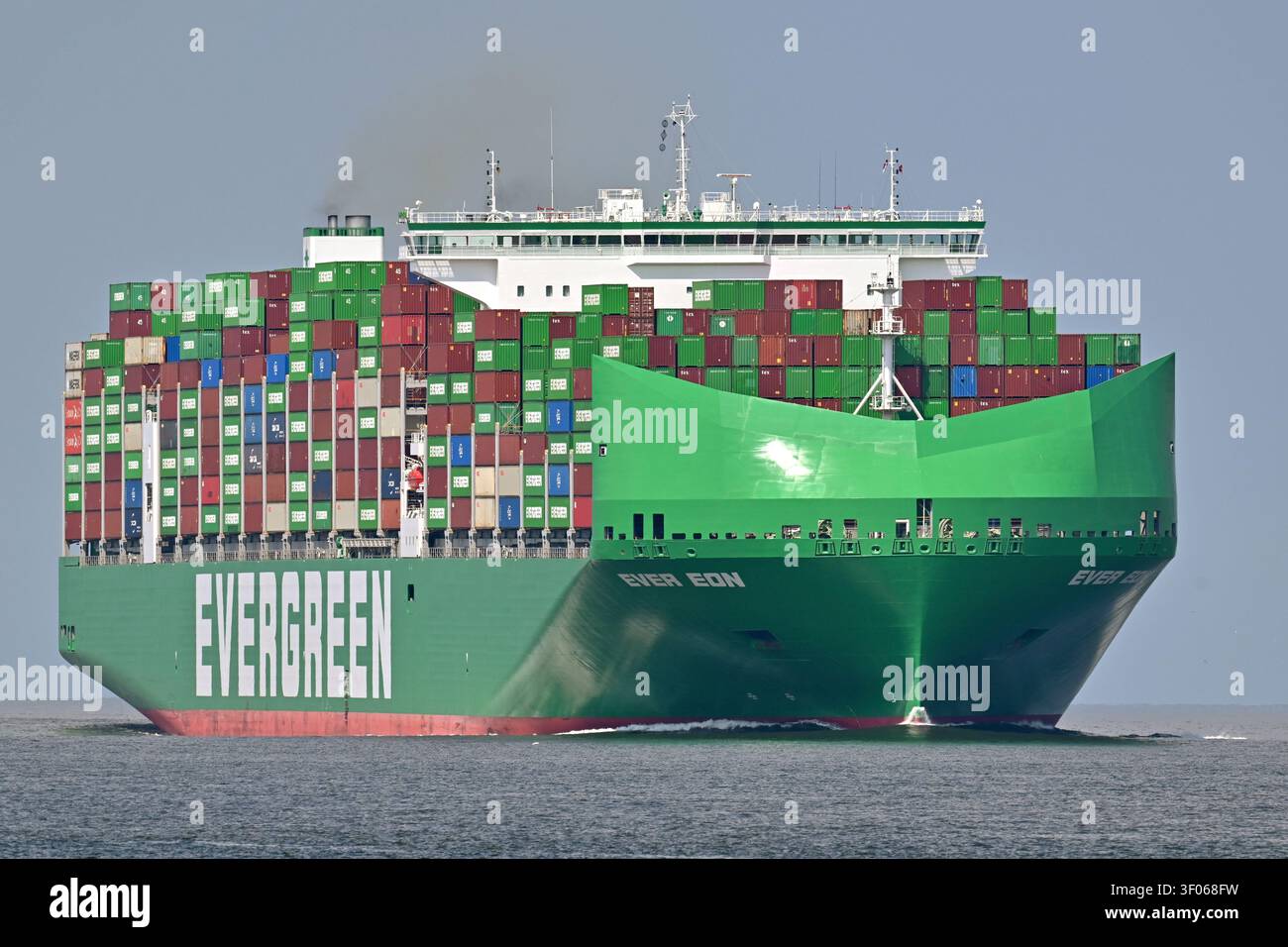 Containership EVER EON passing Cuxhaven Stock Photo