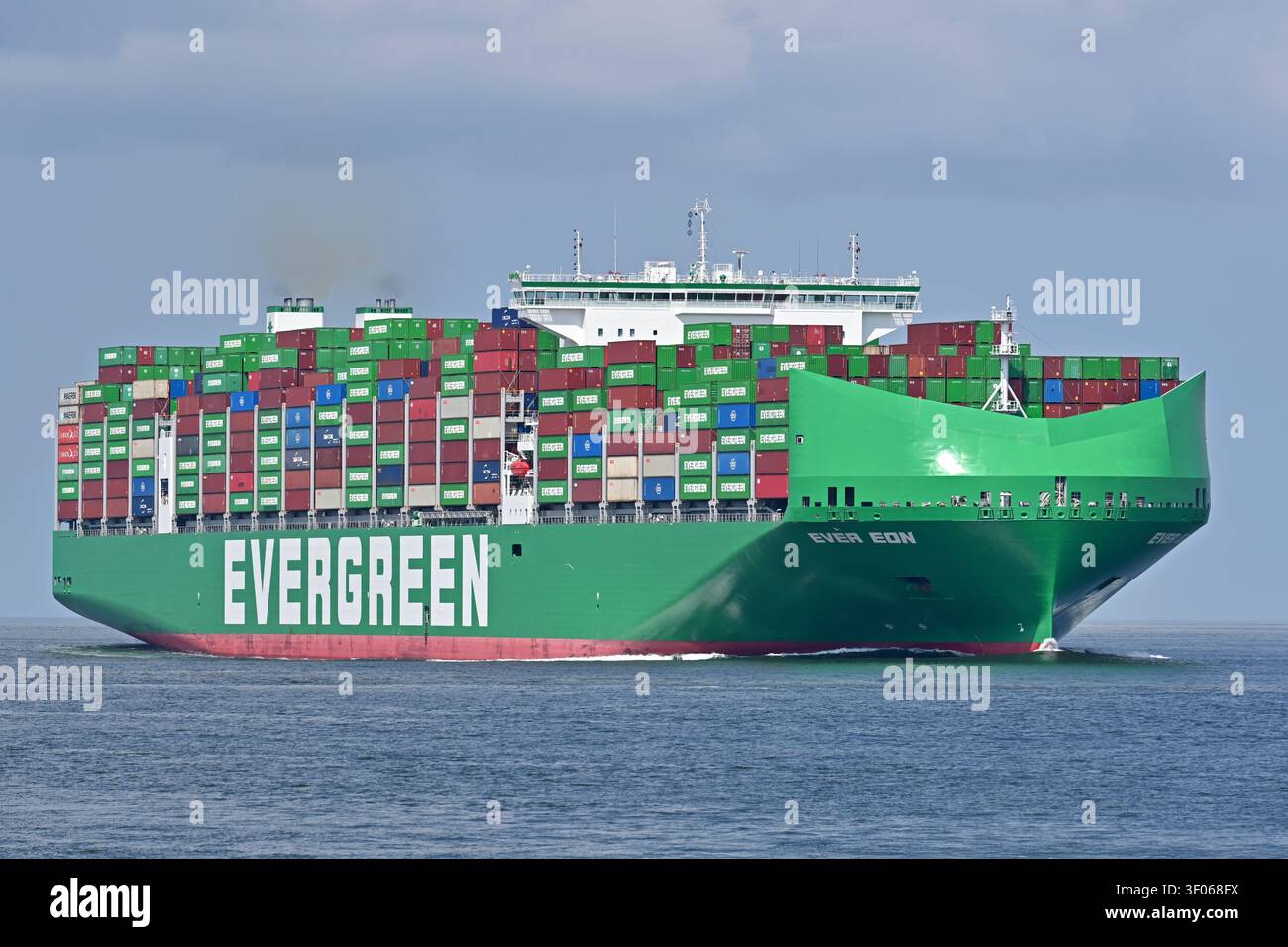 Containership EVER EON passing Cuxhaven Stock Photo