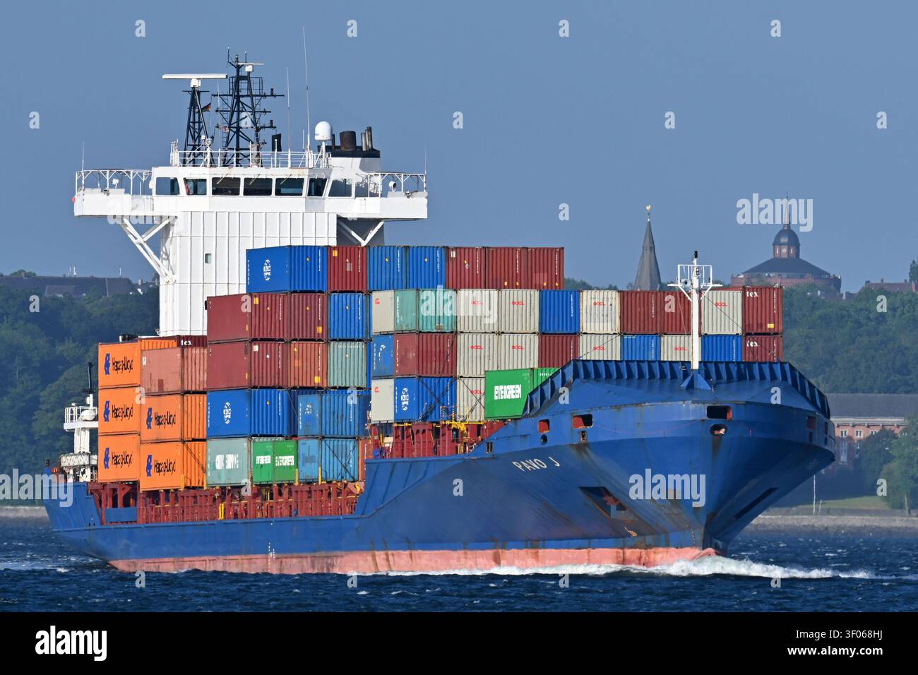 Containership PAVO J at the Kiel fjord, heading for the baltic sea Stock Photo