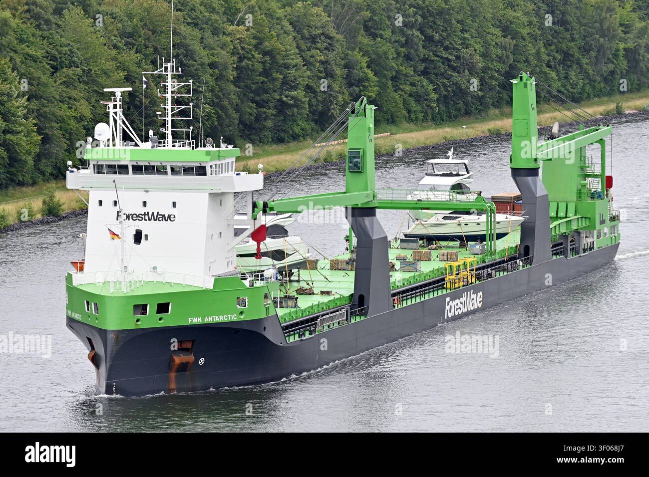 General cargo ship FWN ANTARCTIC passing the Kiel canal Stock Photo
