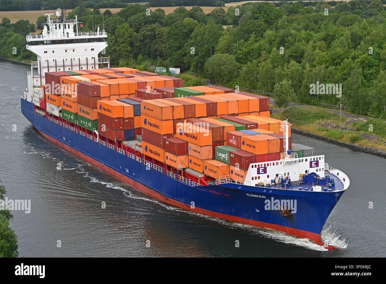 Containership ELBMOON paasing the Kiel canal Stock Photo