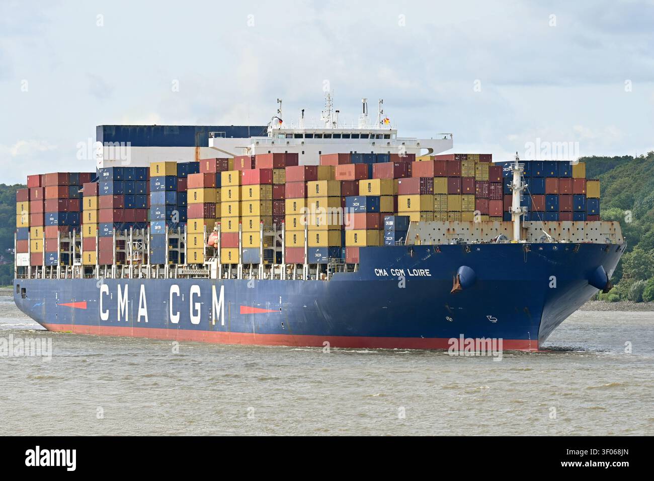 Containership CMA CGM LOIRE arrives at the port of Hamburg Stock Photo