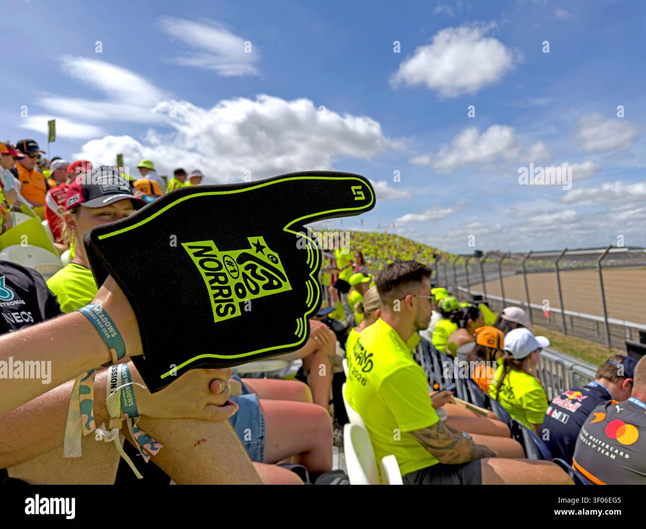 Anticipation Lando Norris foam hand is held aloft in the sunny Landostand before the Silverstone British GP, 05 Jul 2026 Stock Photo