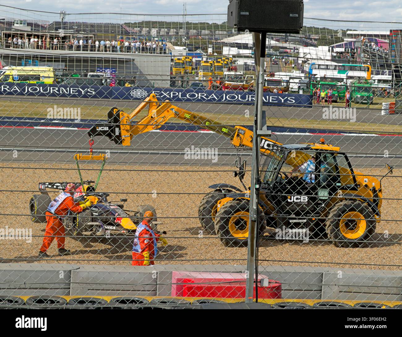 Max Verstappen’s Red Bull is recovered from the gravel after crashing out at Stowe during the British Grand Prix, Silverstone, 05 Jul 2026 Stock Photo