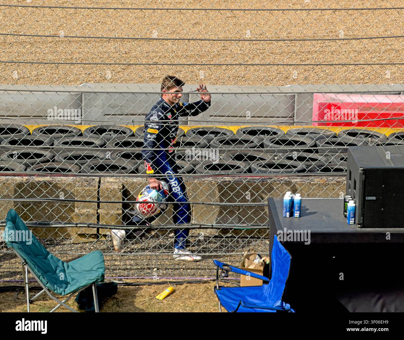 Helmet in hand, Max Verstappen waves to Landostands as he walks back past the barriers after his Red Bull crash at Stowe, Silverstone, 05 Jul 2026. Stock Photo