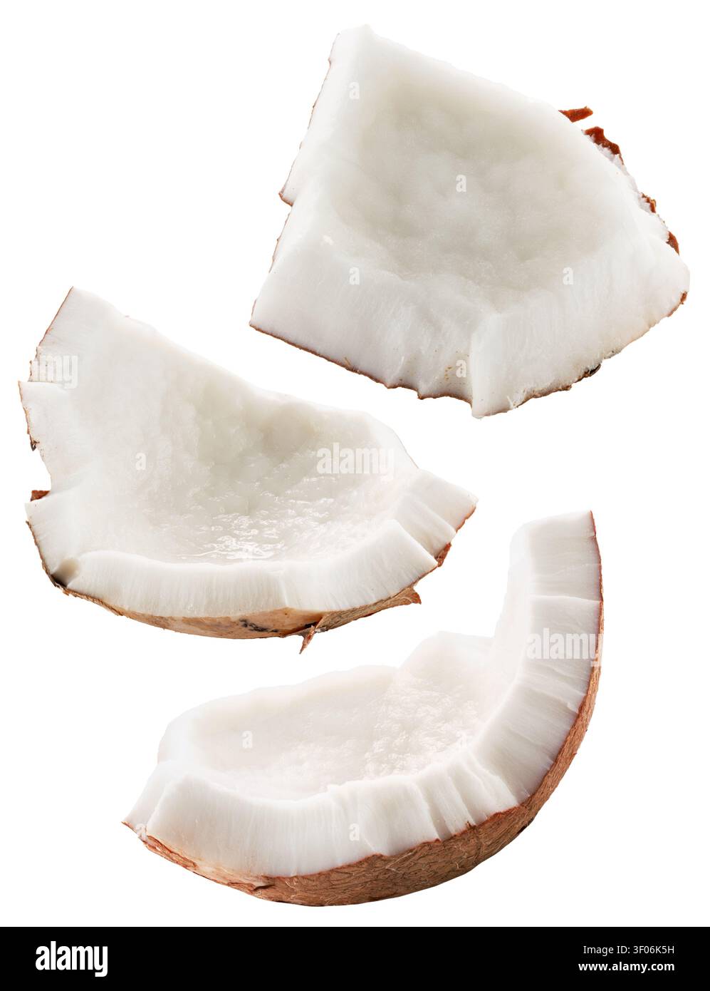 Three pieces of fresh sliced organic coconut fruit isolated on white. Stock Photo
