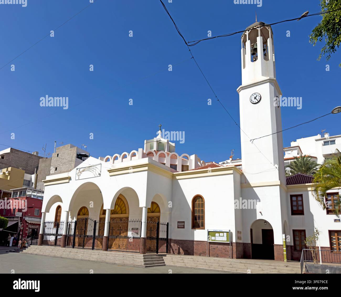 Our Lady of Mount Carmel church in Los Cristianos, Tenerife, Canary Islands, Spain, under a clear blue sky. Stock Photo