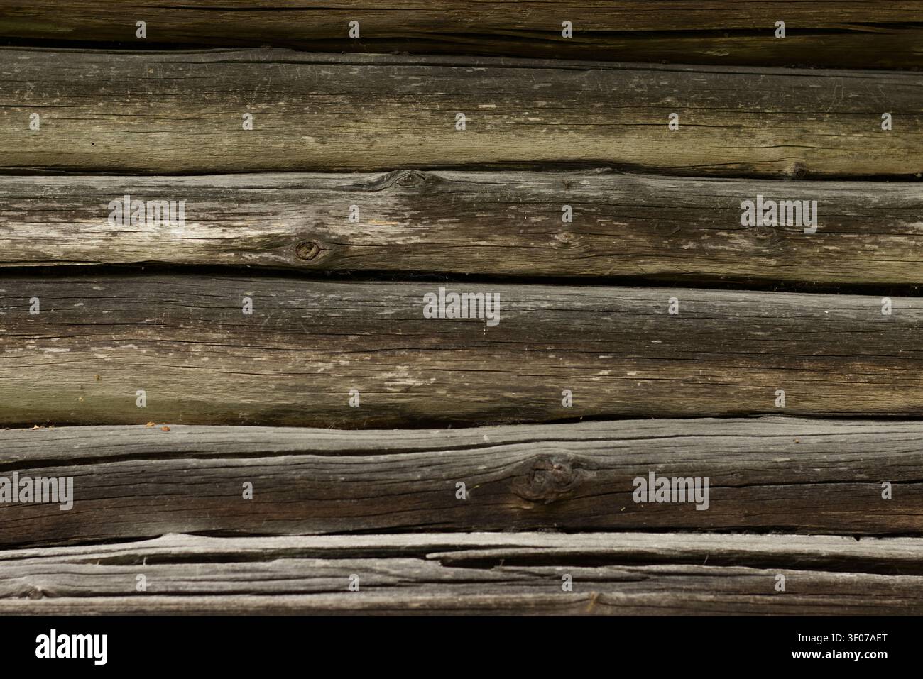 Old log wall with natural wood texture Stock Photo