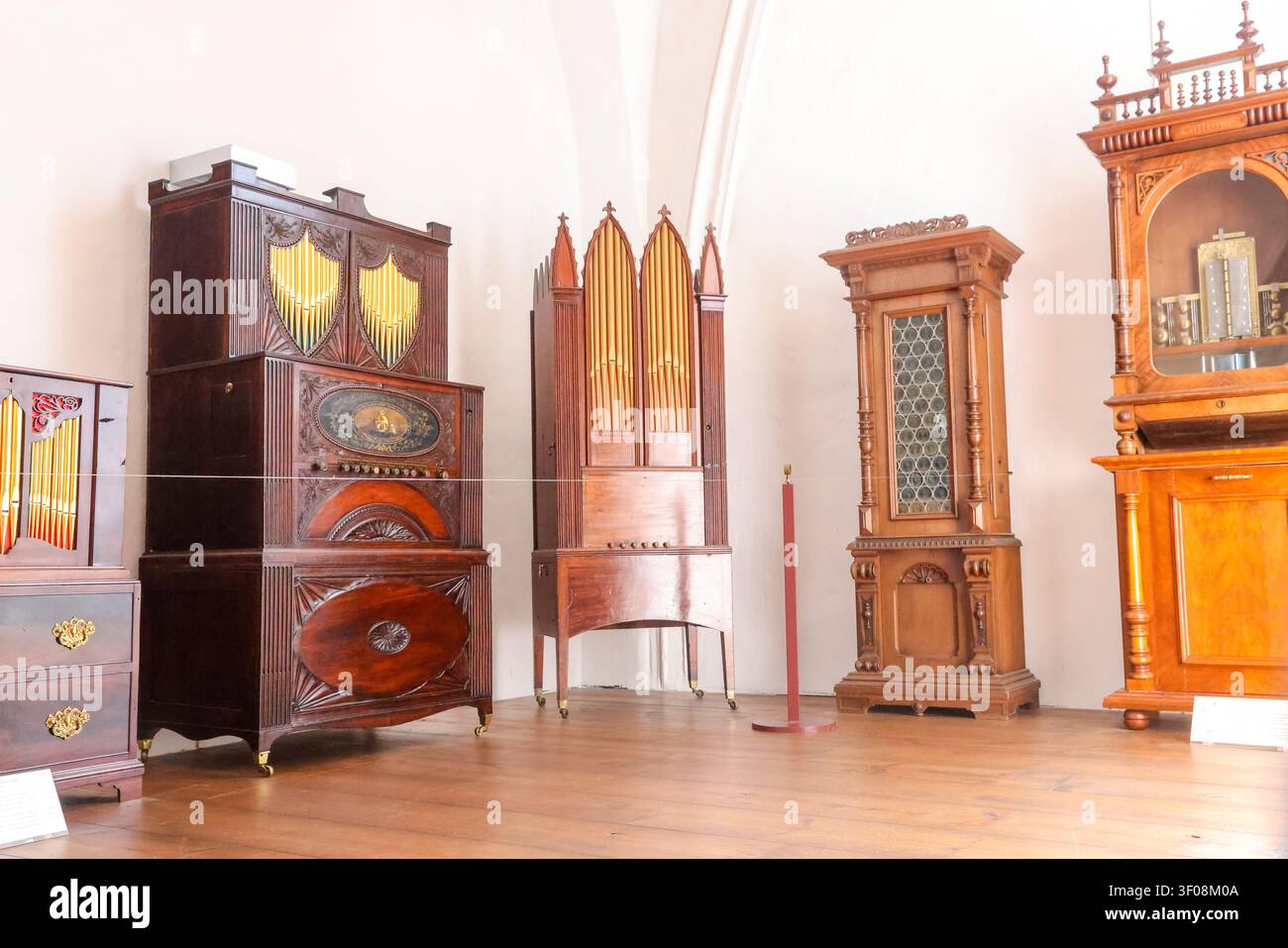 Collection of antique musical clocks and mechanical instruments inside Museum Speelklok in Utrecht, Netherlands. Stock Photo