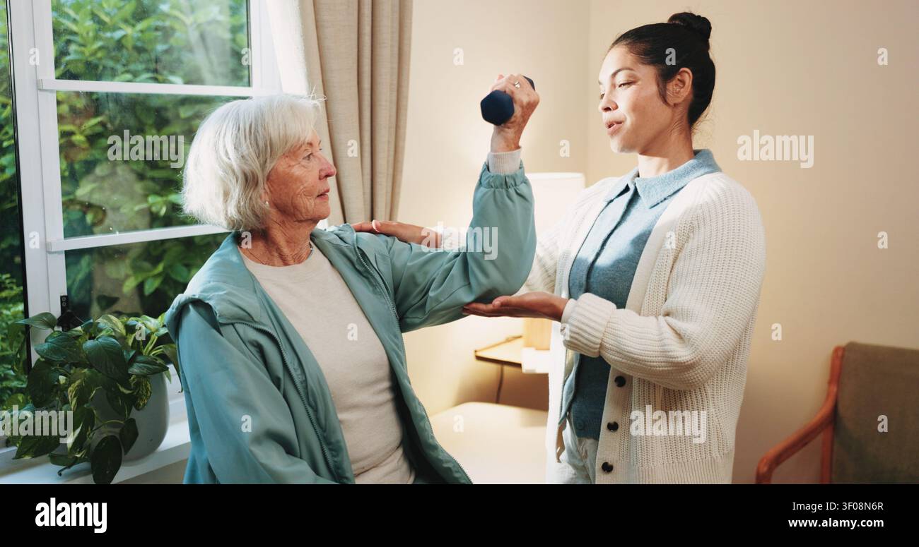 Dumbbell, fitness and senior woman with therapist in retirement home for healthcare or wellness. Help, rehabilitation and weights with old person in Stock Photo