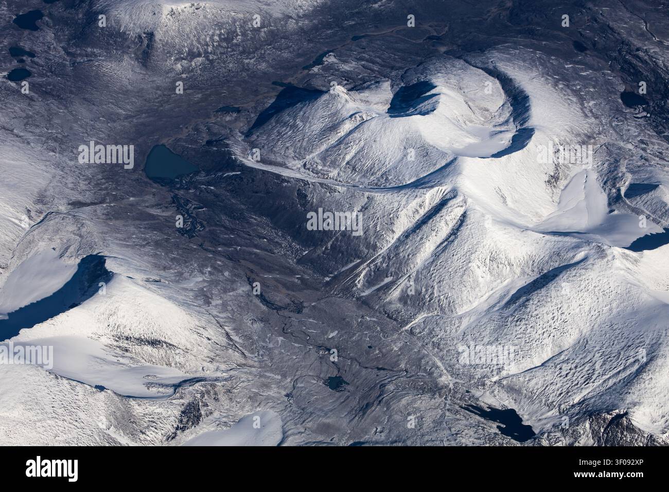Snow-covered volcanic landscape viewed from above Stock Photo