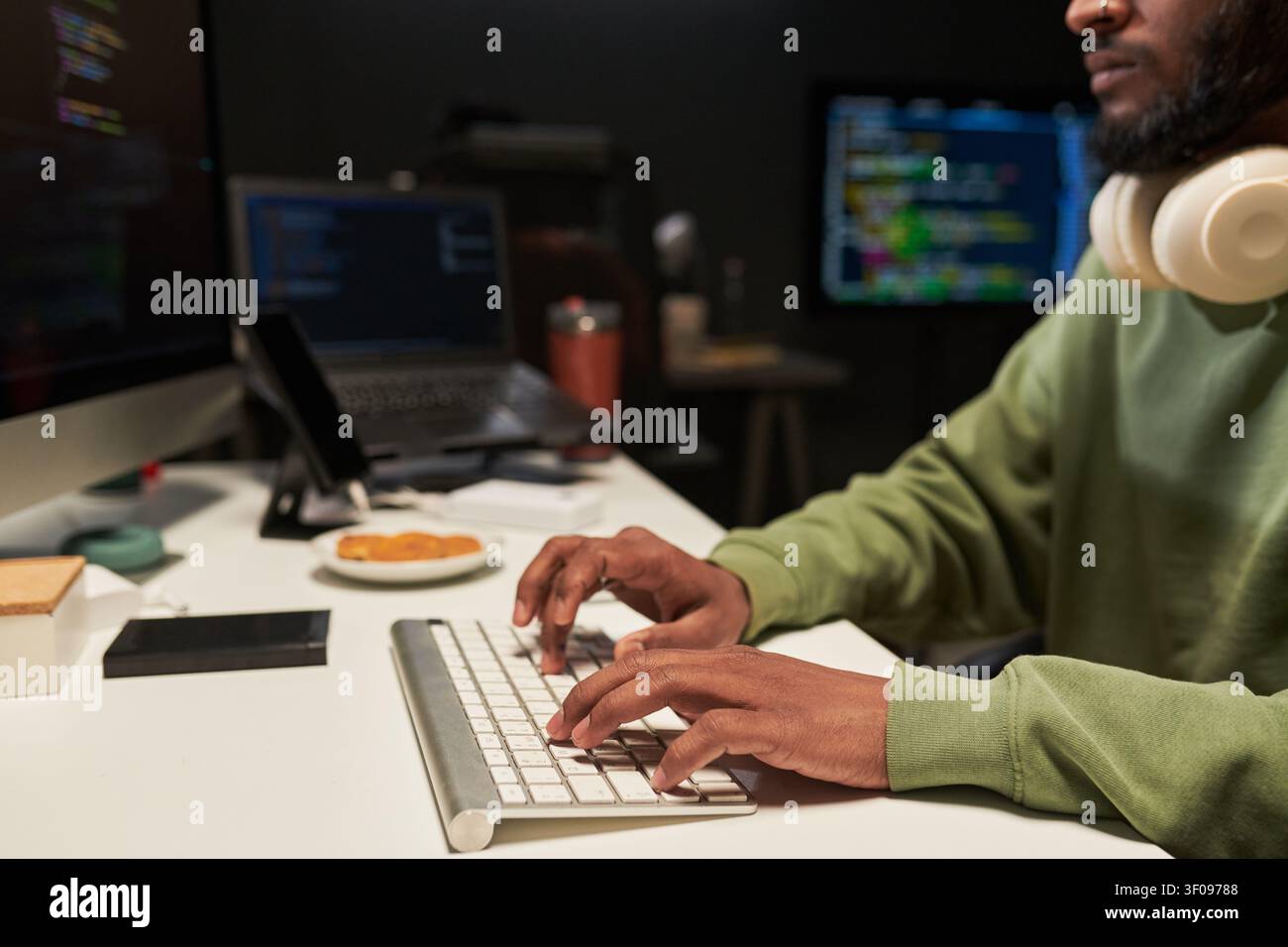 Midsection of Man Coding at Desk for Software Development Project Stock Photo