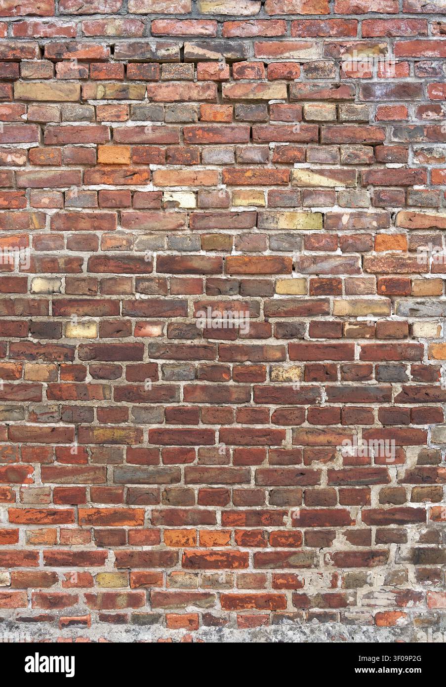 Grunge brick wall in portrait format - architecture background Stock Photo