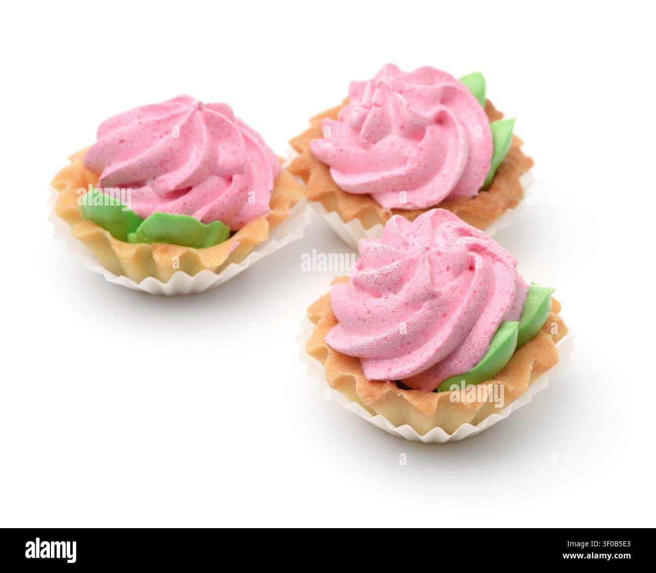 Three mini custard tart cakes isolated on white Stock Photo