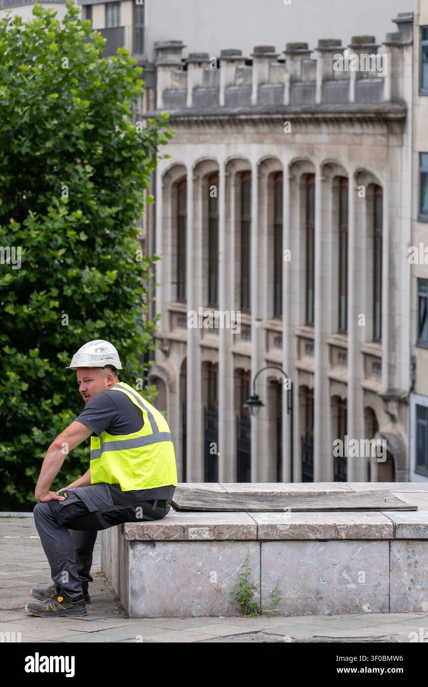 Resting construction worker Stock Photo