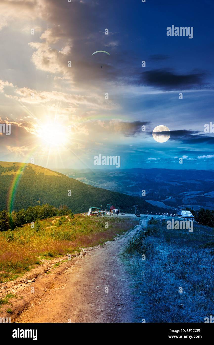 hiking path in carpathian mountains. day meet night. sun and moon over alpine nature of transcarpathia in summer. ukraine mountain landscape for trave Stock Photo