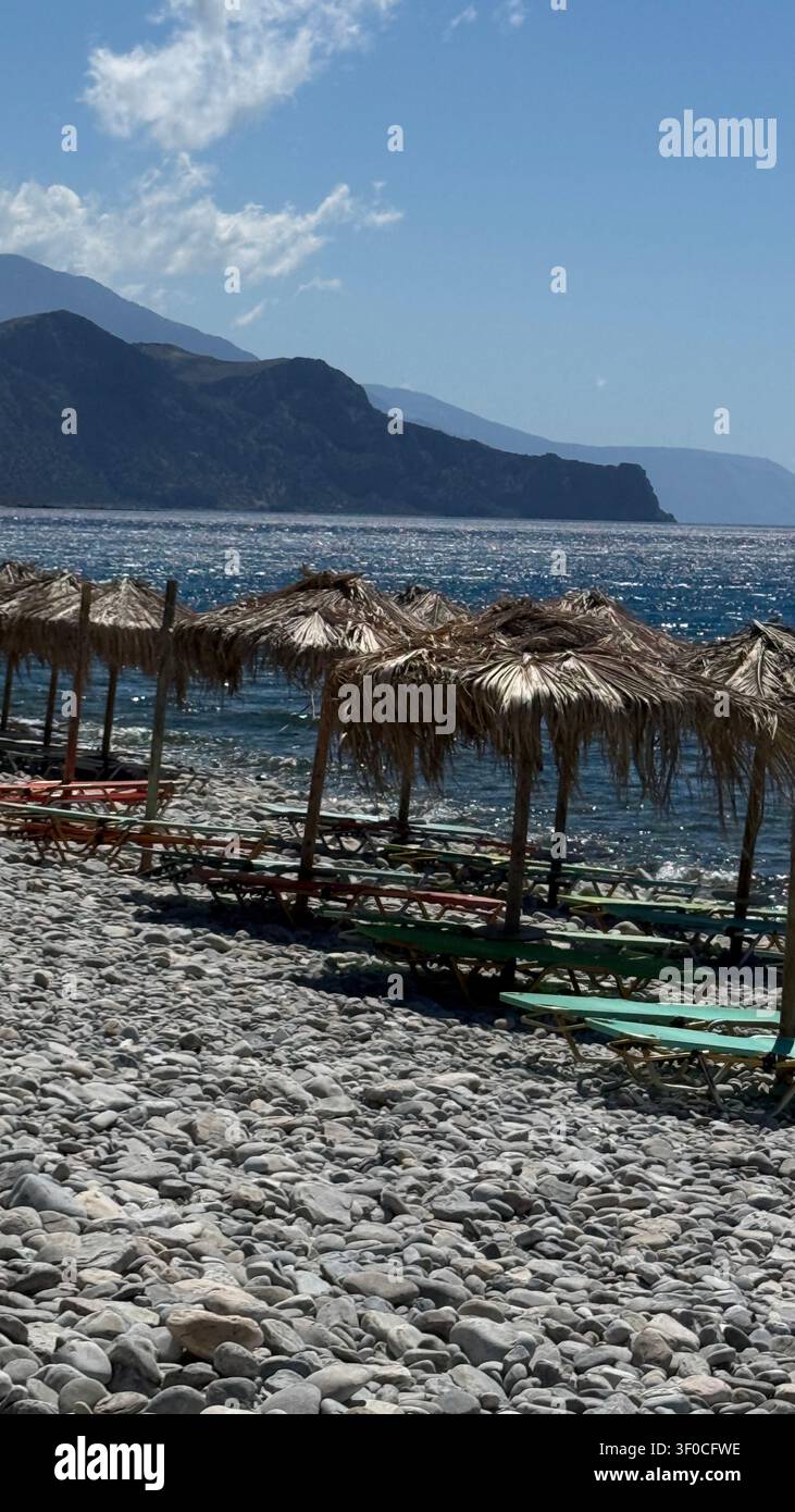 Serene empty beach gentle waves hi-res stock photography and images - Alamy
