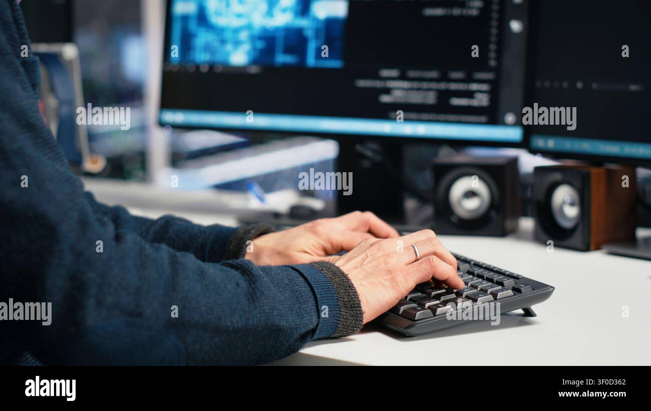 Administrator programs on a computer workstation in a high tech data center with generative AI assistance. Stock Photo