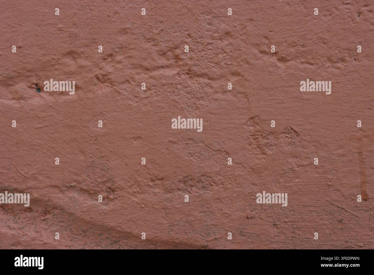 Brown concrete wall texture. Damaged, uneven wall for background. Stock Photo