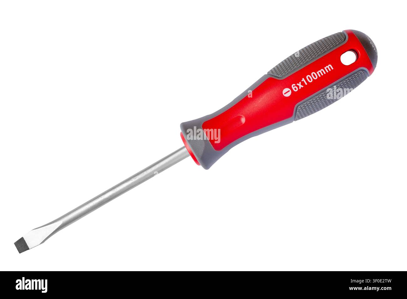 Modern red slotted screwdriver on a white background. The screwdriver is isolated close-up. Stock Photo