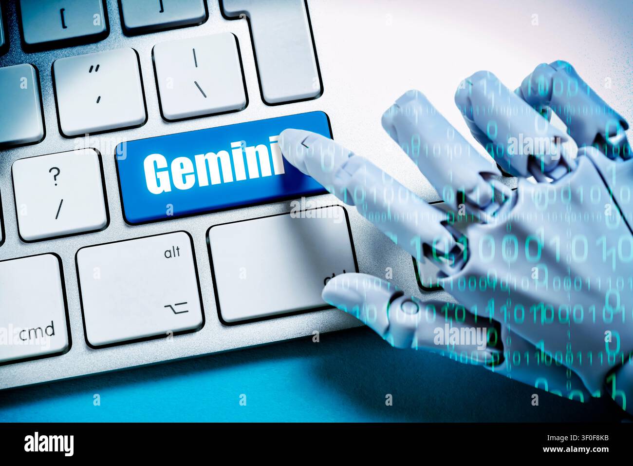Robot hand with binary code presses key labeled Gemini on a computer keyboard, photomontage Stock Photo