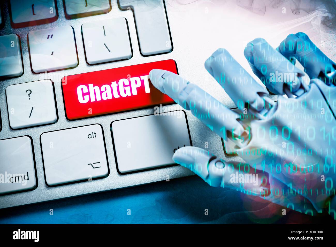 Robot hand with binary code presses key labeled ChatGPT on a computer keyboard, photomontage Stock Photo