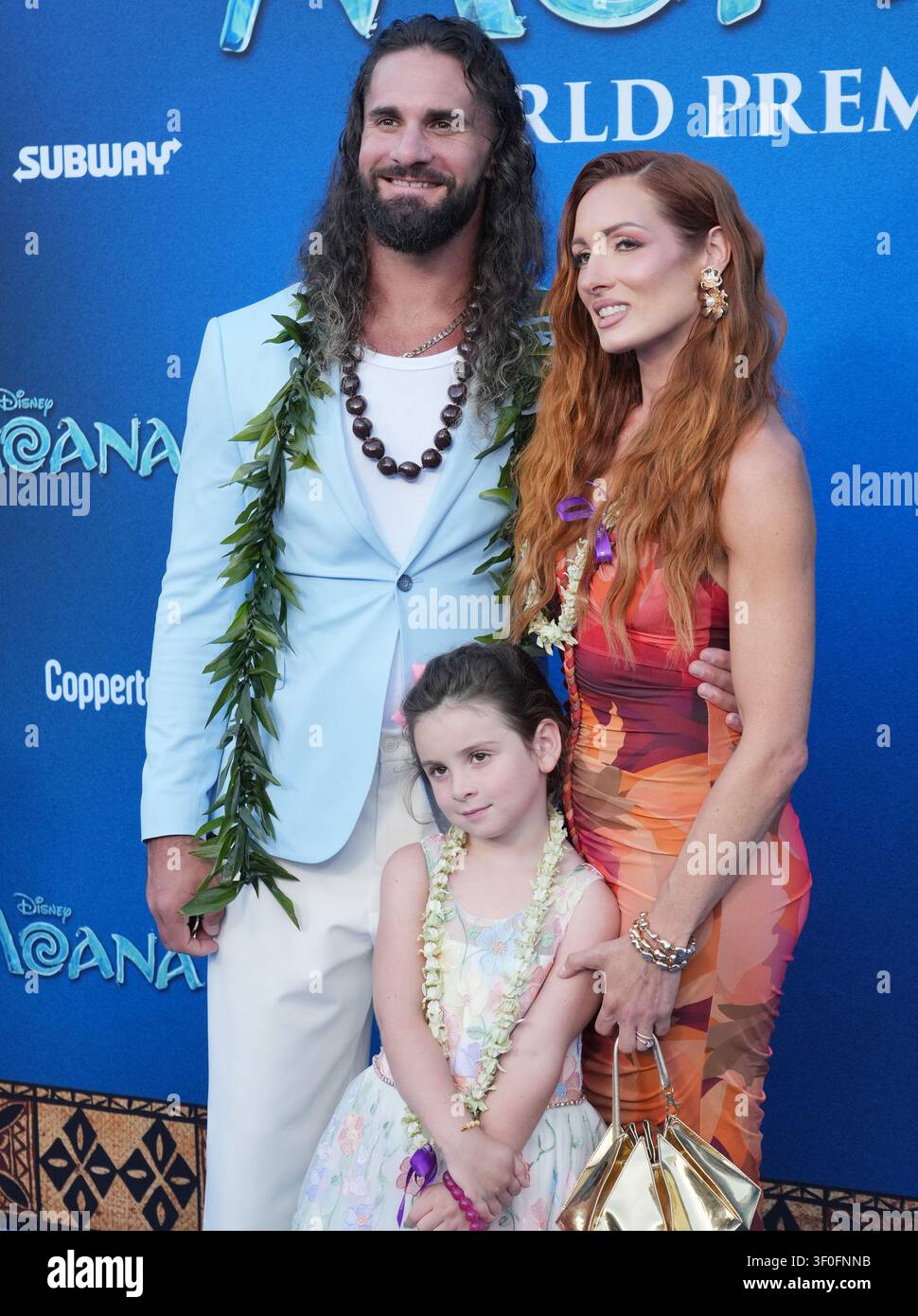(L-R) Seth Rollins, Roux Lopez and Becky Lynch at the Disney's MOANA ...