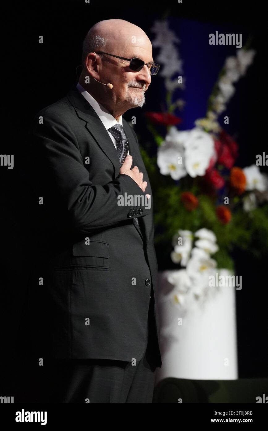 Why does Salman Rushdie view free speech as being under assault?