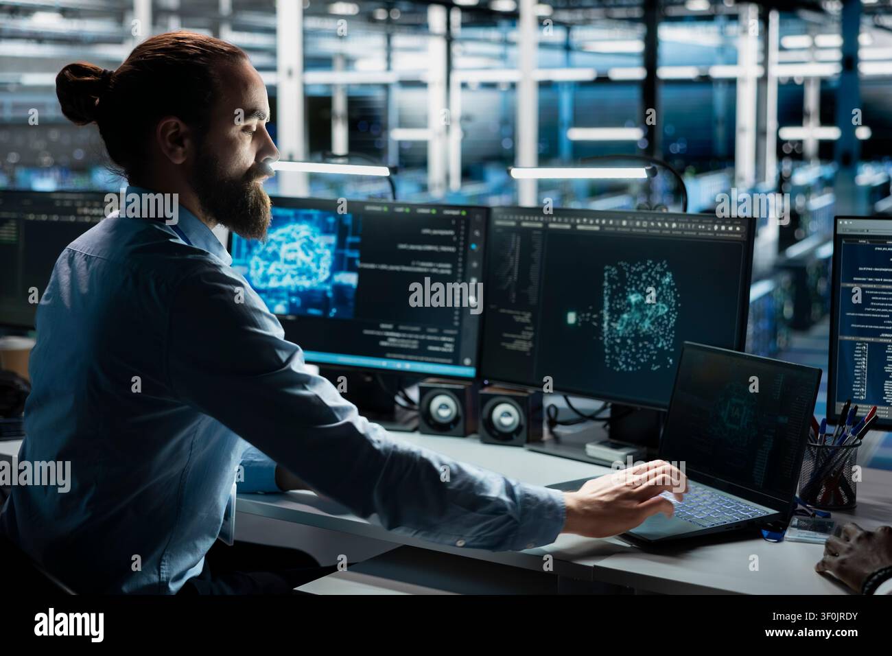 Server room system administrator running simulations for AI driven prediction, tracking performance. Stock Photo