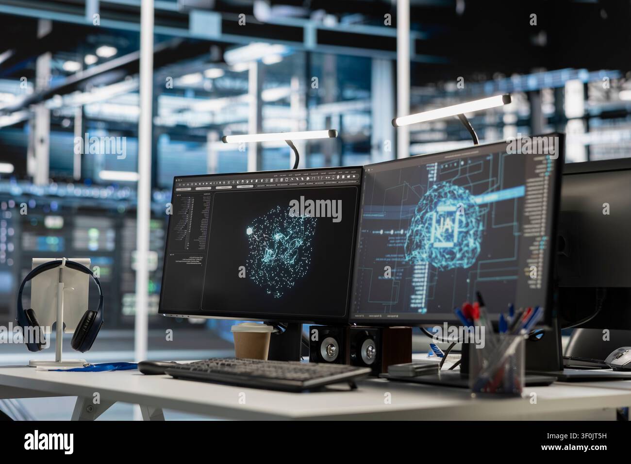AI research workstation displays neural network visuals and code analysis tools. Stock Photo