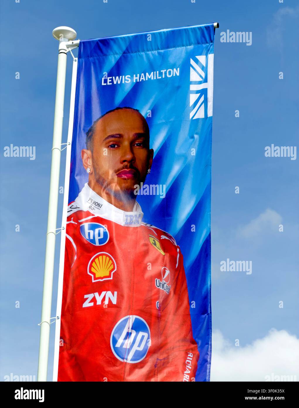 Trackside flag showing British Formula 1 F1 GP driver Lewis Hamilton in Ferrari racewear at the 2026 British Grand Prix, Silverstone. Stock Photo