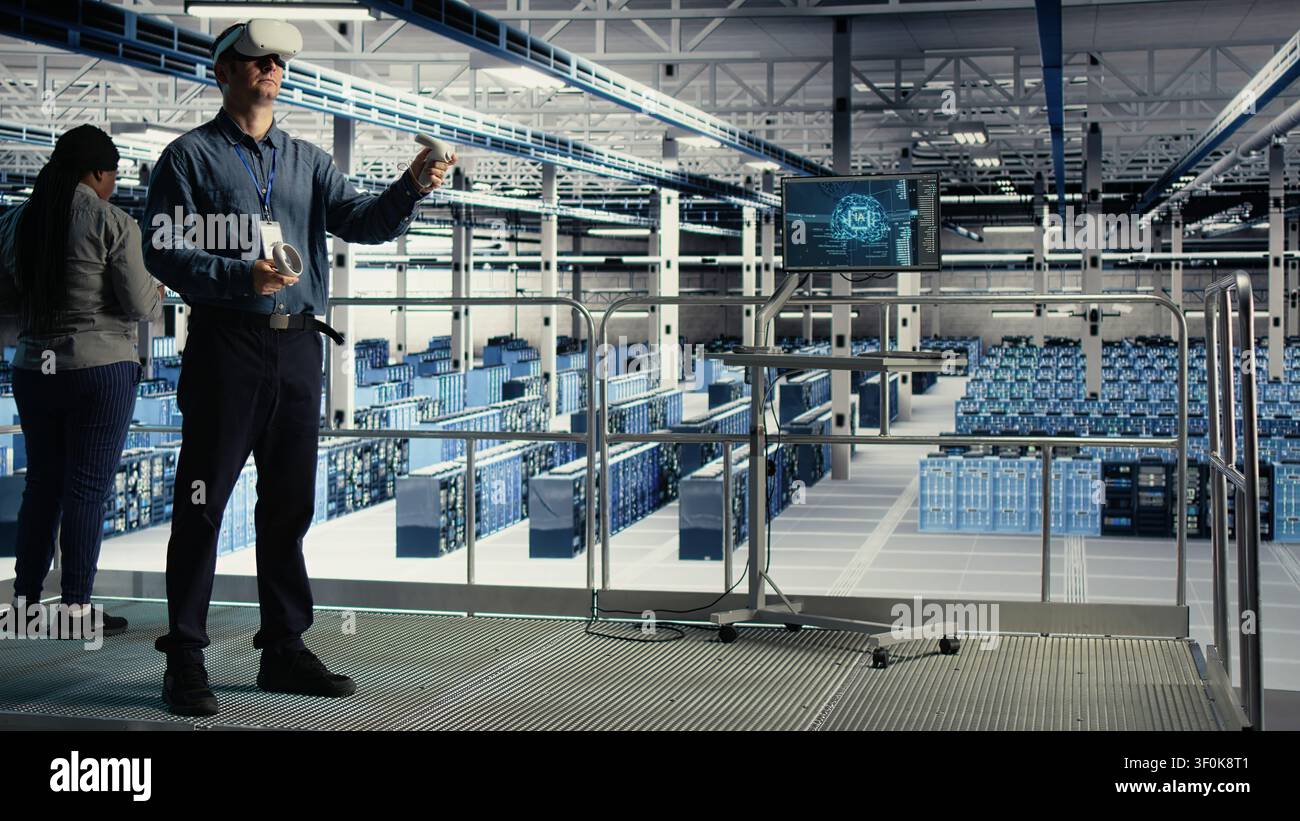 Programmer uses a VR headset in a server room to adjust AI systems and improve processing performance. Stock Photo