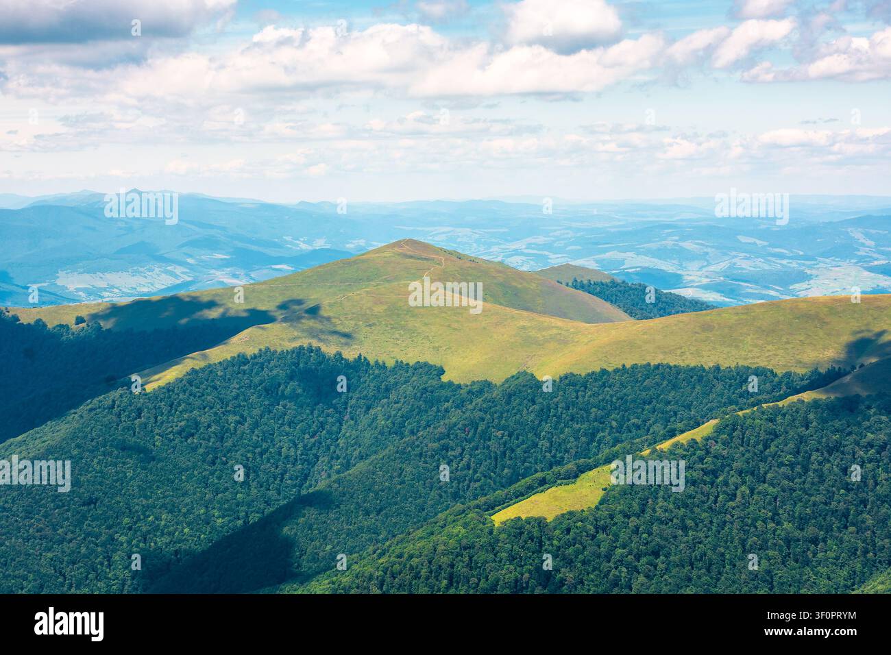 beautiful mountain landscape in summer. travel ukraine background. rolling hill in dappled light. scenic view of borzhava ridge. carpathian mountain s Stock Photo