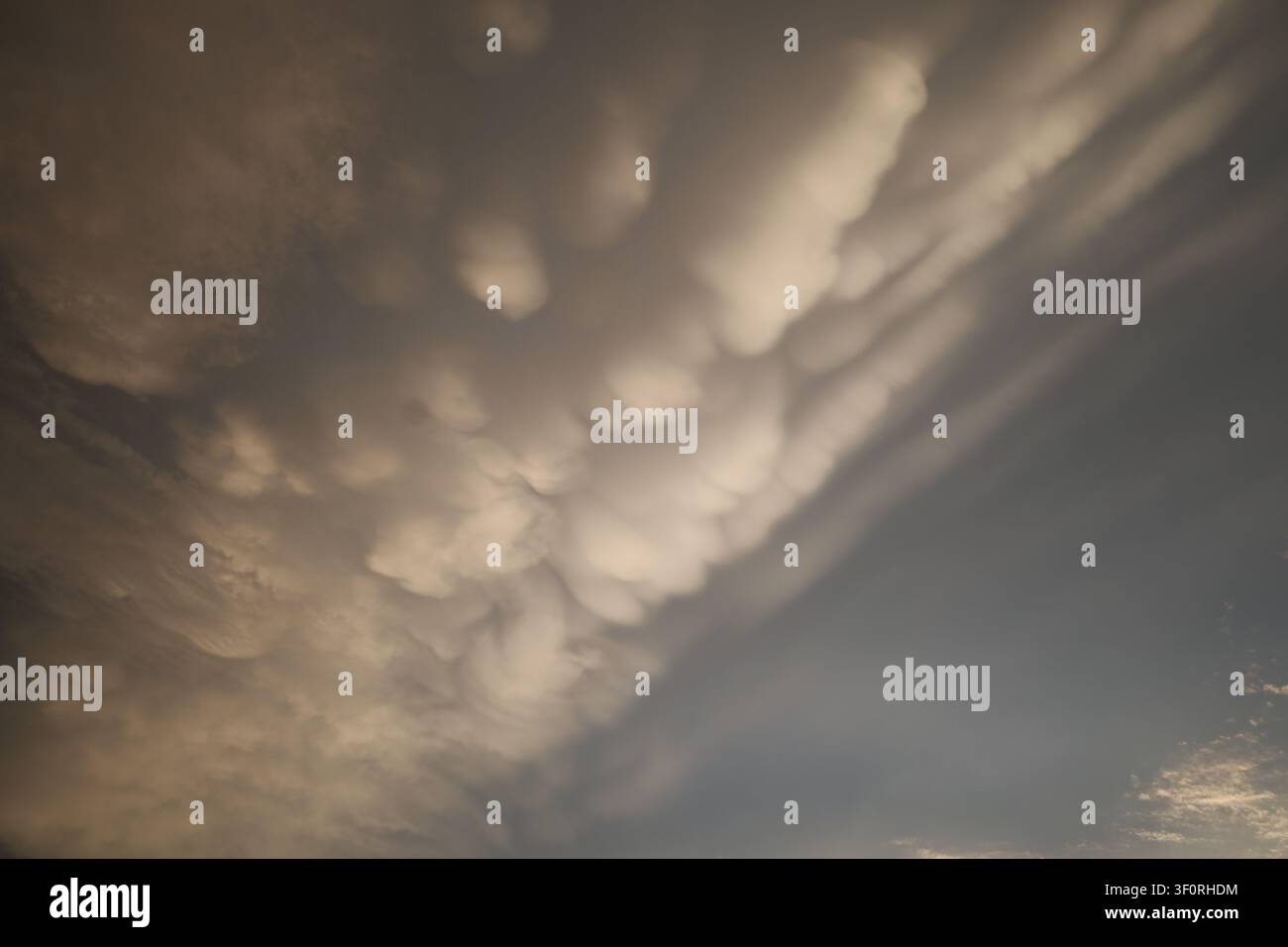 Dramatic Mammatus Clouds Before Storm Stock Photo