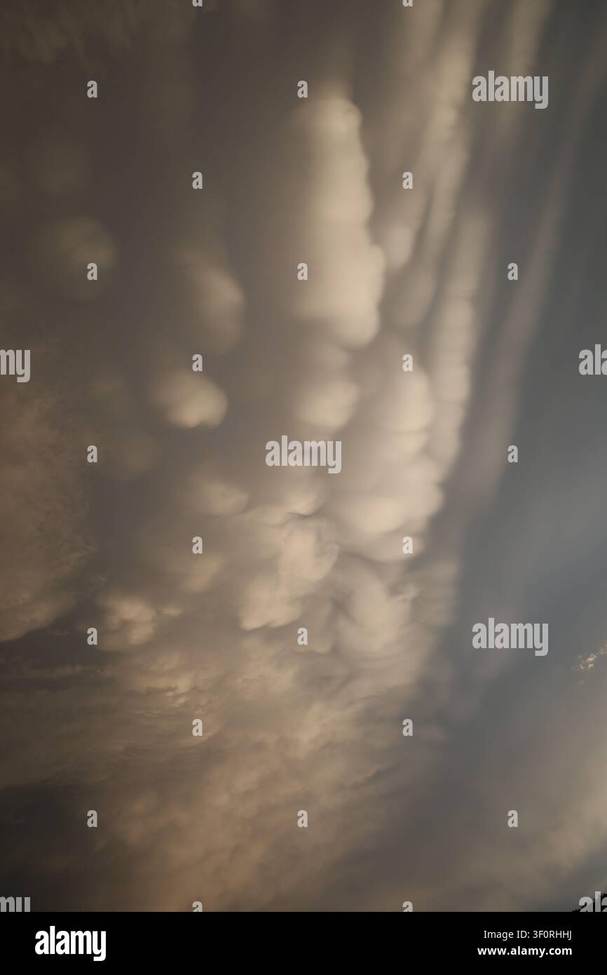 Dramatic Mammatus Clouds Before Storm Stock Photo