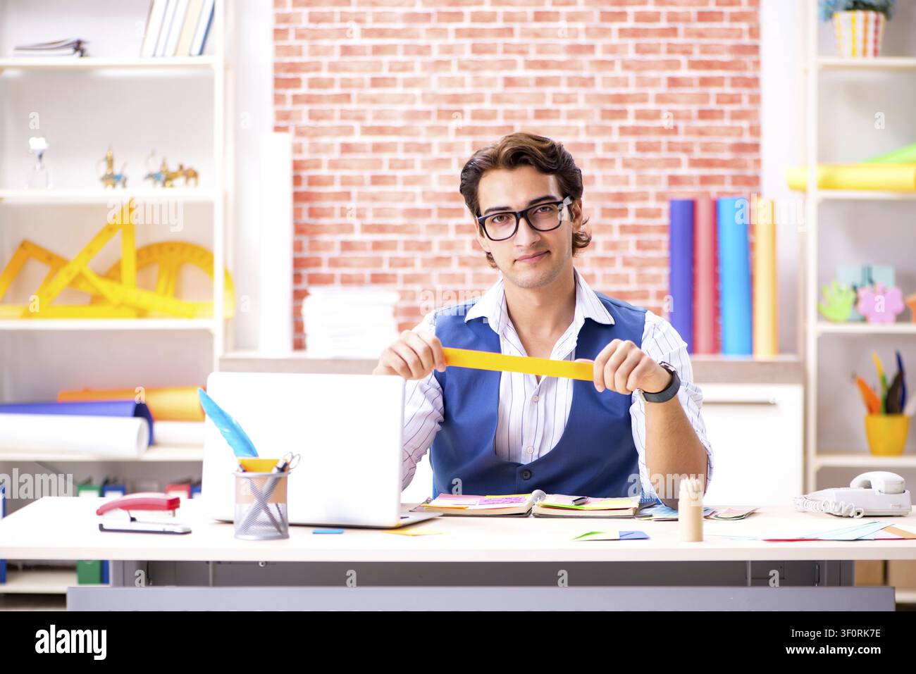 Young designer freelancer working on new project Stock Photo