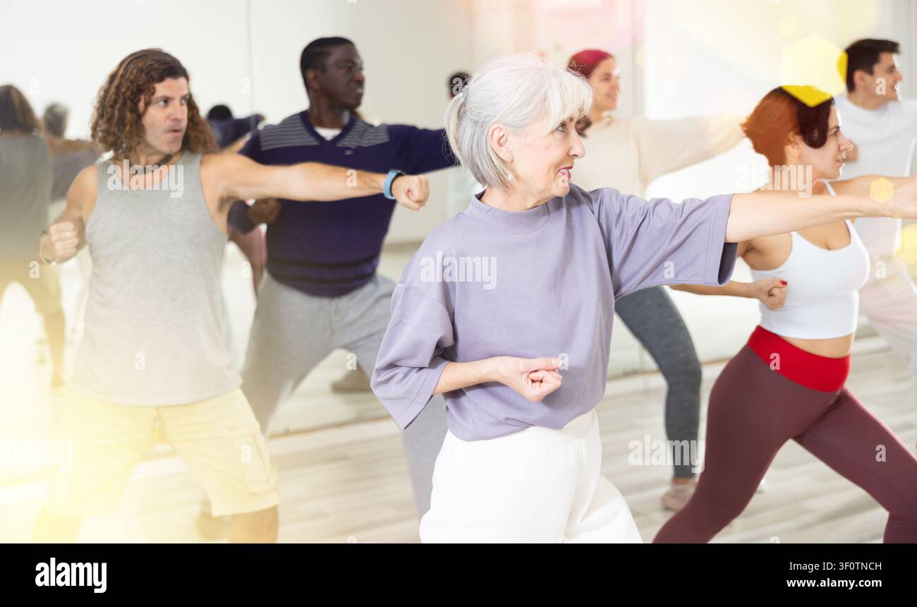 Group of multinational people practicing new modern dance techniques Stock Photo