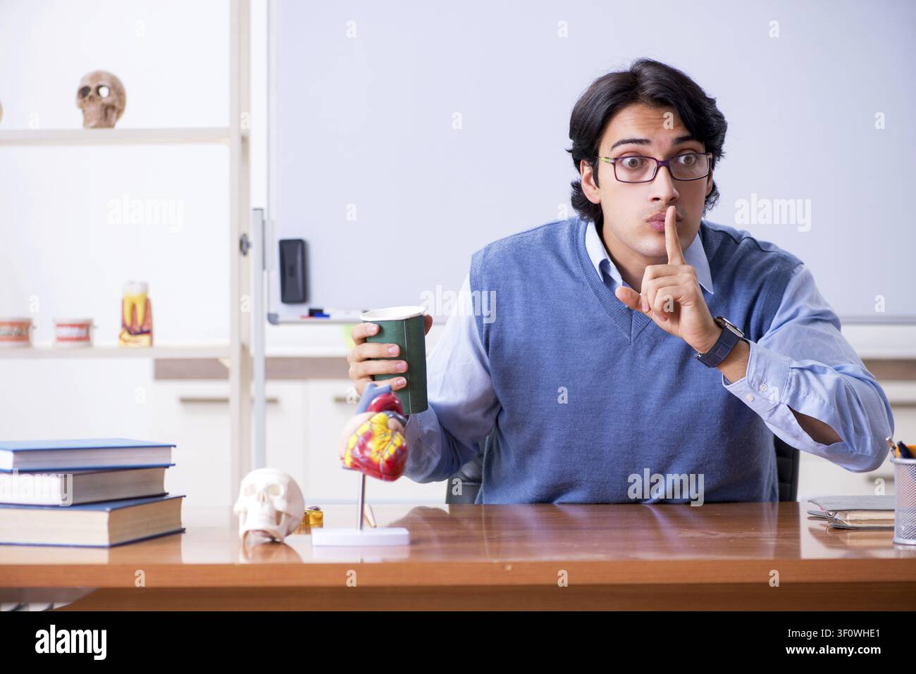 Young lecturer teacher teaching anatomy Stock Photo