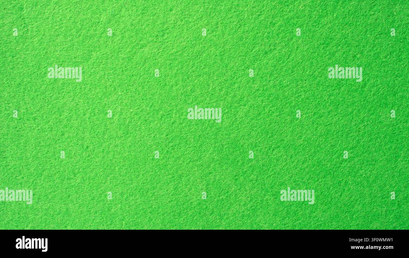 Bright green felt fabric texture background close up Stock Photo