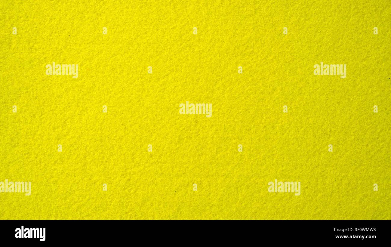 Vibrant yellow felt texture background for craft and design Stock Photo