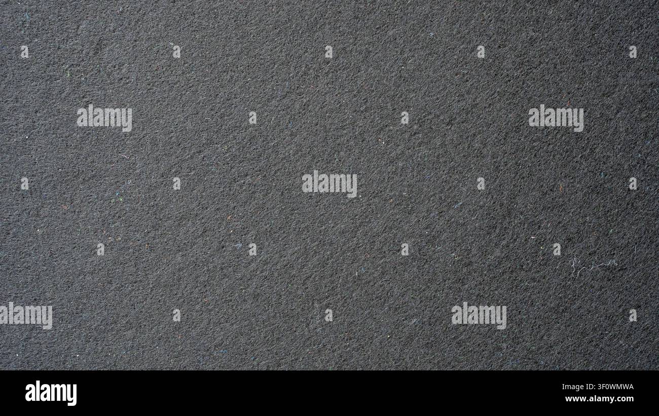 Charcoal gray felt fabric texture background close up Stock Photo
