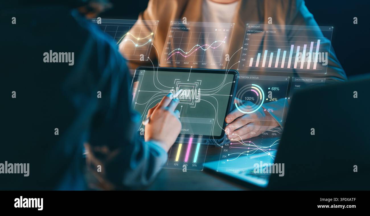 Modern business professionals collaborate and analyze complex data visualizations using an advanced artificial intelligence dashboard. The image evoke Stock Photo