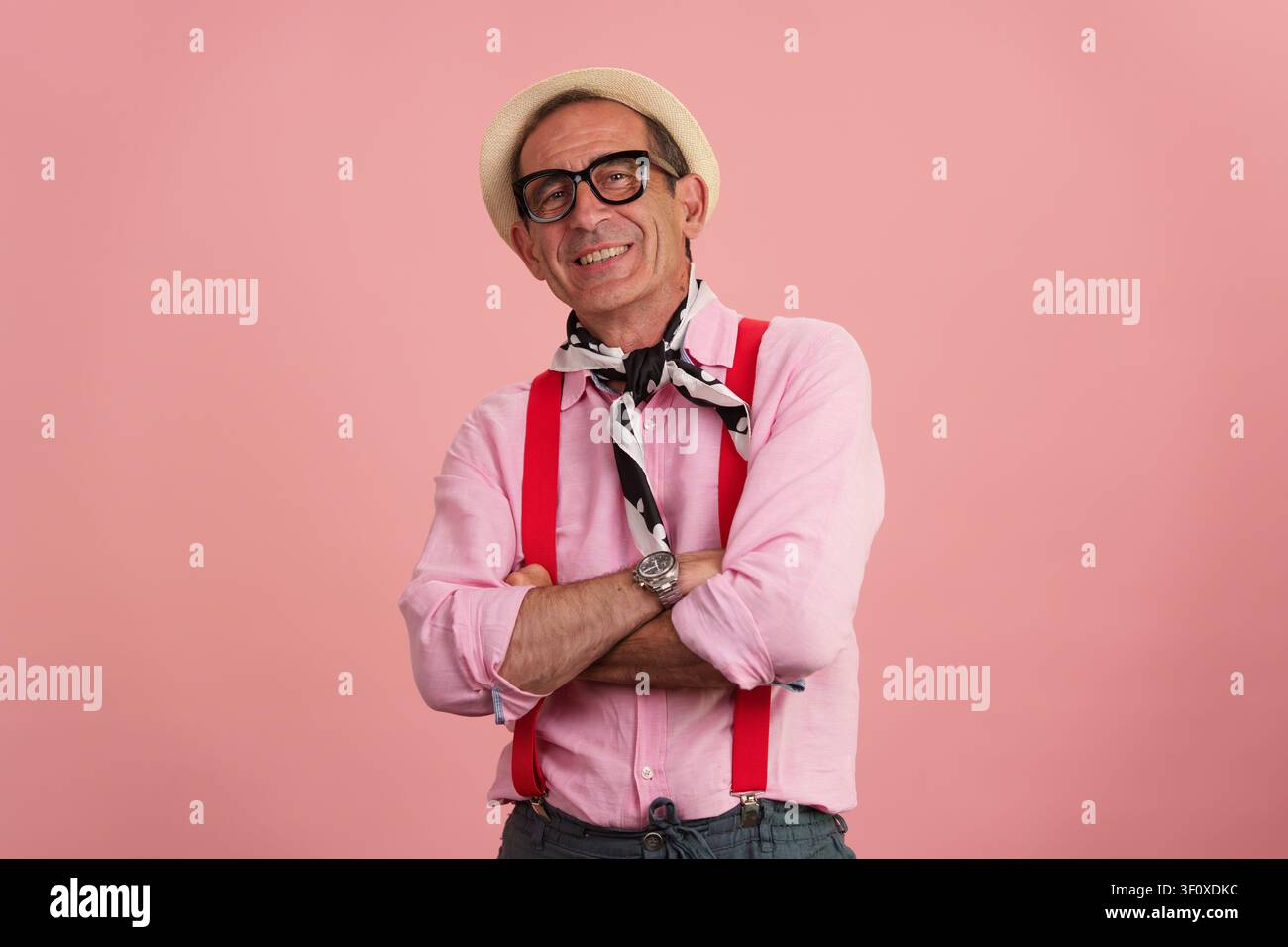Senior man smiling, embracing positive healthy maturity Stock Photo
