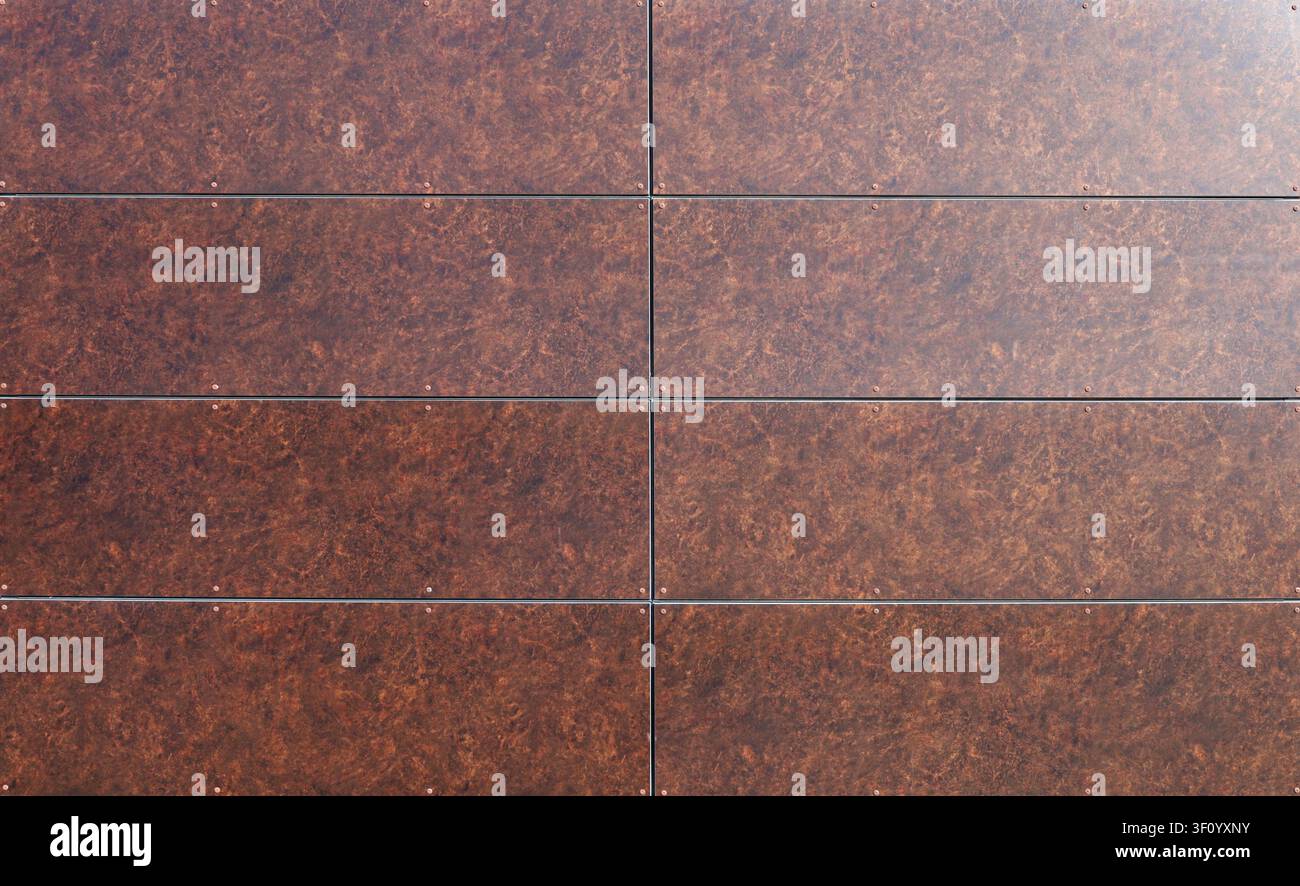 Long rectangle brown tiles for ventilated facade cladding with stone effect. Background and texture. Stock Photo