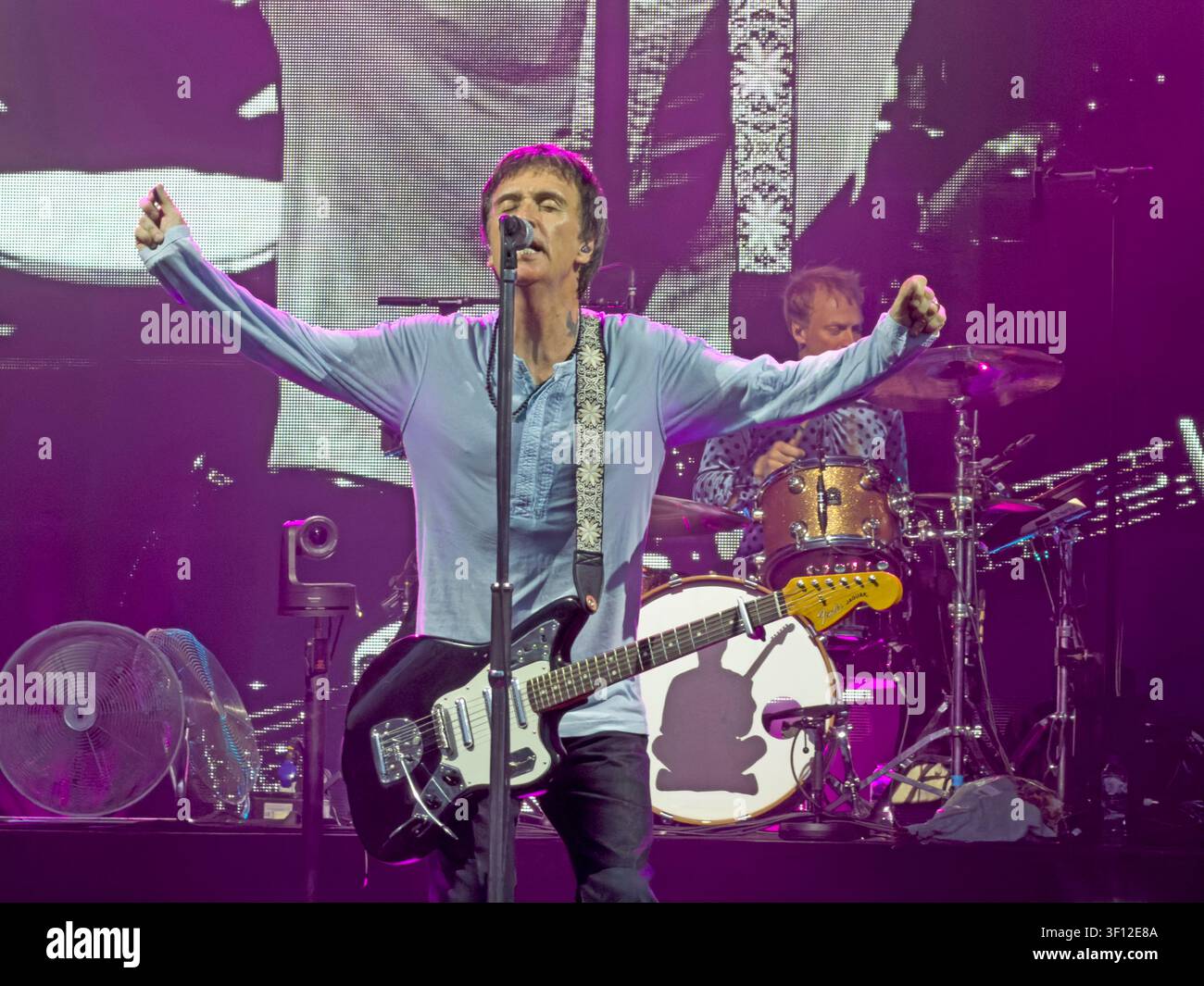 Former Smiths guitarist Johnny Marr commands the stage at Castlefield Bowl, Manchester, during his biggest solo headline show. Stock Photo