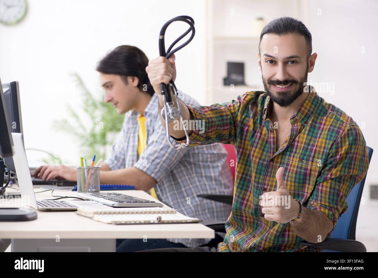 IT engineers working on hardware issue Stock Photo